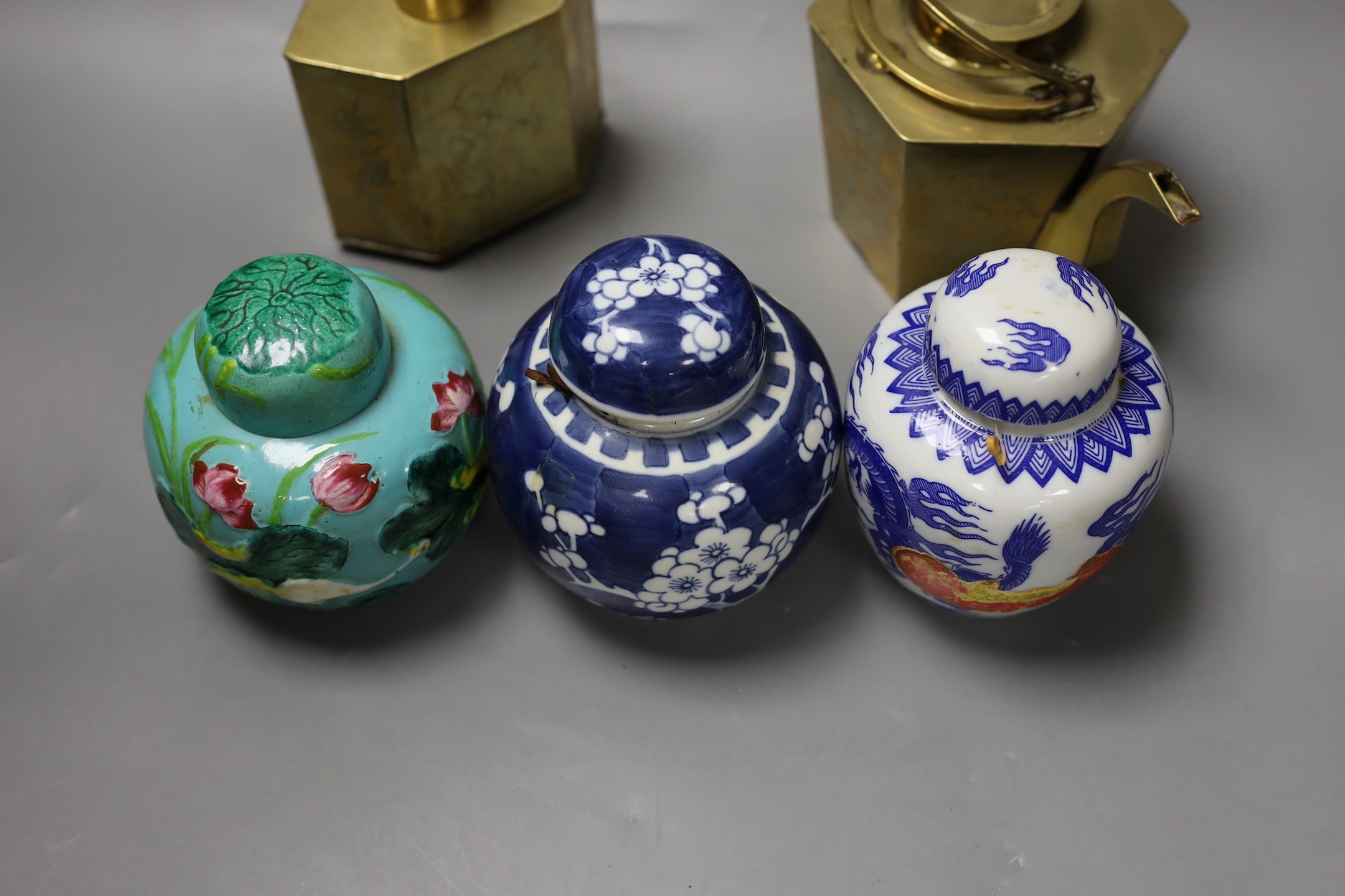 A Chinese brass tea caddy and kettle together with three similar blue and white porcelain bowls, three jars and covers and a Japanese vase